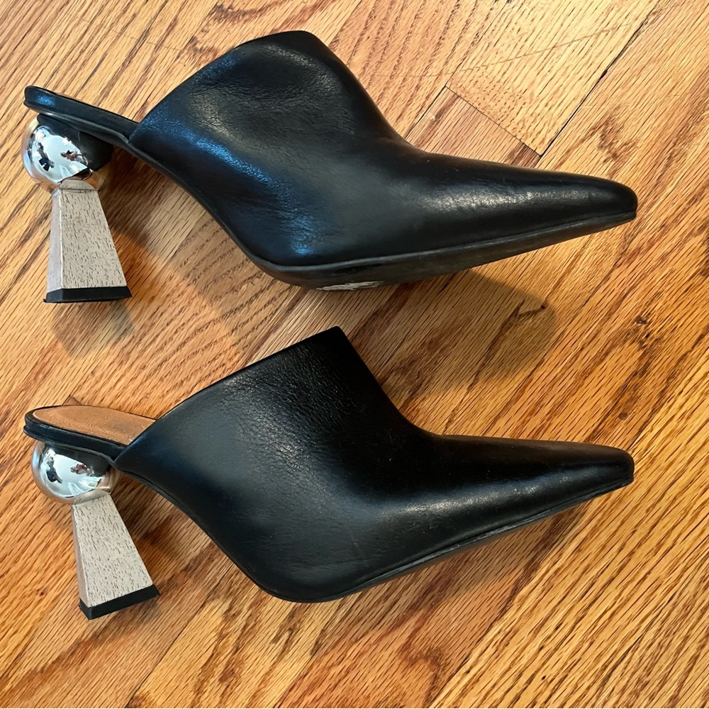 Jonak. Mules. Size EU 40.  Black leather with gold ball and blonde wood heels.